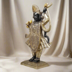 Standing Brass Srinath Ji as Bihari ji statue with detailed jewelry, raised hand, gold accents