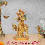 Brass Krishna playing flute figurine on cow, multicolor meenakari detailing