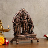 Copper Ram Darbar idol, side view showing central figure and surrounding attendants