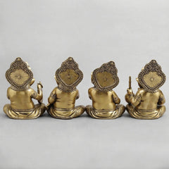 Brass Ganesh musicians set, rear view of four seated figures with ornate circular back designs