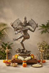Brass dancing Shiva Nataraja statue with four arms, raised leg, on pedestal