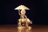 Brass Krishna idol, side/back view with umbrella and bull, on circular base