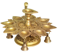 Brass Deepak table decor, ornate circular base with nine shallow oil cups