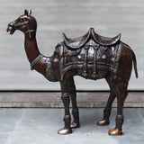 Copper-finish brass camel sculpture, ornate saddle, standing, 49 in tall