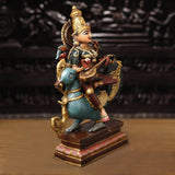 Brass Saraswati sculpture with veena, three-quarter view on ornate base