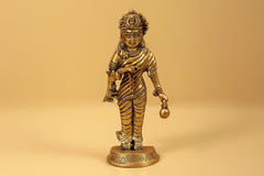 Brass Navadurga deity idol standing, draped garments and round pedestal base