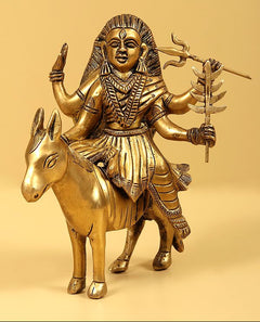 Brass Navadurga idol riding bull, deity holding trident and raised symbols