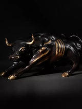 Wall Street bull wall sculpture, 28 in tall; black and gold brass figure