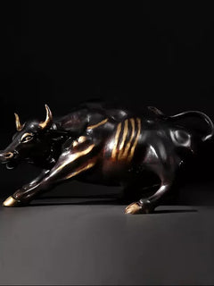Brass bull sculpture for Wall Street decor, crouching pose with gold stripes