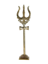 Handcrafted brass trishul figurine with three-prong top and crossbar, on stepped base.