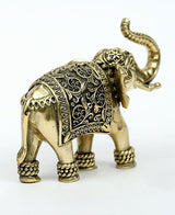 Brass elephant figurine rear/side view, upraised trunk, decorative filigree panel