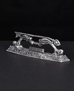 Small brass Shri Ram's Dhanushe with detailed filigree and arched frame