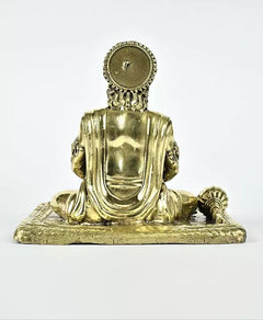 Brass Hanumanji idol back view, round halo, draped torso, ornate base and ornaments