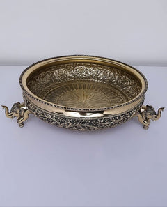 Brass elephant-design urli viewed from front, ornate scrollwork and 14 in height