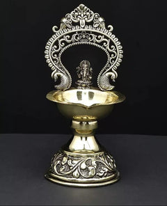 Brass Ganesha diya lamp with ornate arch and side elephants, 5-inch