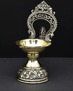 Brass Ganesha diya lamp with raised arch, two elephant figures, 5-inch