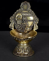 Brass Tirupati Balaji conch diya, 4 in height, seated deity with ornate base