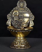 Brass conch diya featuring Tirupati Balaji figure, 4 in, front view with details