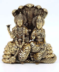 Brass Lakshmi-Narayana statue, seated on Sheshnag, ornate crowns and jewelry