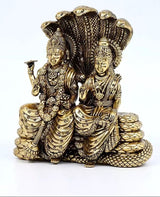 Brass Lakshmi-Narayana seated idol on Sheshnag, two figures with beaded ornaments