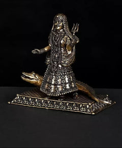 Brass Ganga goddess idol front view, Makara beside base and intricate etched patterns