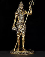 Standing Lord Shiva brass idol, holding trident and damaru, ornate round base