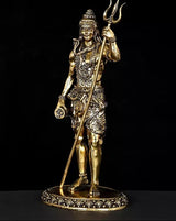 Standing Lord Shiva brass idol with trident held upright, gold finish
