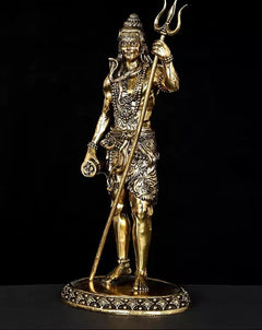 Standing Lord Shiva brass idol with trident held upright, gold finish