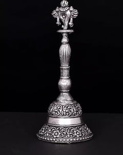 Silver-plated brass conch bell with carved midsection ridges and decorative bell rim