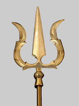 Brass trishul head with three curved blades and detailed finial at base