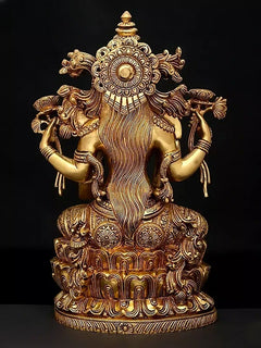 Brass Lakshmi statue, back view, patterned circular halo and ornate carved back details