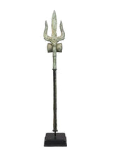 Brass trishul spear ornament on square wood base, three-prong top