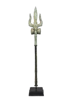 Brass trishul spear ornament on square wood base, three-prong top