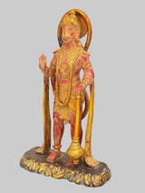 Brass Lord Hanuman standing statue with raised palm, curved tail, round ornate base