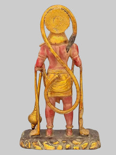 Brass Lord Hanuman standing statue from behind, gold staff and red body, textured base