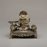 Brass Maa Saraswati seated sculpture with halo, raised hands, veena