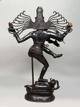 Dancing Shiva Nataraja brass sculpture, side view with long halo arms on base