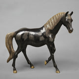 Brass horse statue, three-quarter view; dark bronze body with gold-toned striped mane