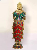 Back view brass Namaste lady sculpture, ornate red, teal, and gold patterned robe