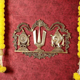 Brass Shankh Chakra Namah wall hanging with ornate arch and central U motif