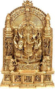 Gold-toned seated Ganesha idol with ornamental arch backdrop and musical accessories