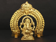 Brass Lord Ganesha statue with arch, 6 in—ornate seated figure
