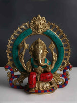 Brass Lord Ganesha statue with turquoise inlay, red-and-blue base, 9 inch