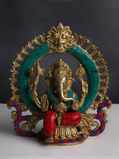 Brass Lord Ganesha statue with turquoise inlay, red-and-blue base, 9 inch