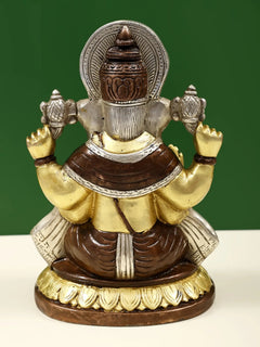 Brass Lord Ganpathi Ganesha idol, back/side view with carved crown and ornaments.