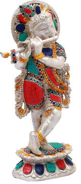 Shri Krishna brass figurine, white face with raised hand and jeweled blue/red garments