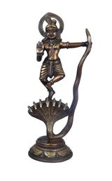 Antique brass Krishna statue of Kaliya Vijaya Lila, standing on cobra base