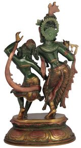 Brass Radha and Krishna dance statue, side view, green garments, ornate headdress