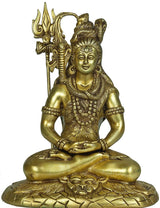 Brass Shiva idol seated with trident, tiger-skin patterned base