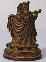 Small brass Radha Krishna statue, side view with draped, decorated garment